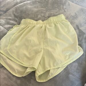 Nike Women's Light Yellow Athletic Shorts